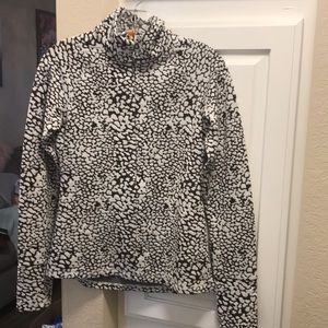 Lucy brown and cream animal print half zip mock turtleneck